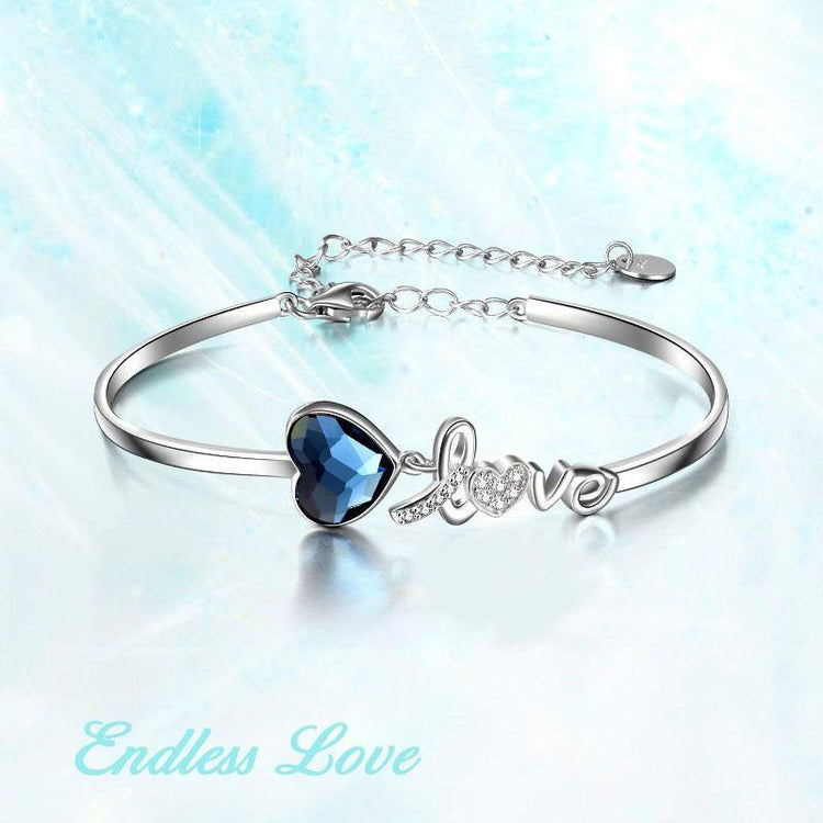 925 Sterling Silver Blue Crystals from Austria Love Heart Bangle Bracelet in White Gold Plated