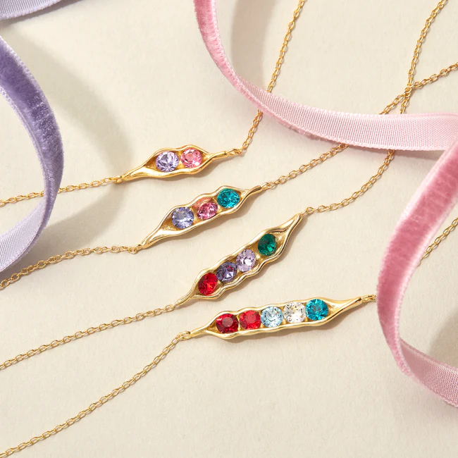 Bracelet en argent sterling 925 pierre de naissance pois dans un pod en or